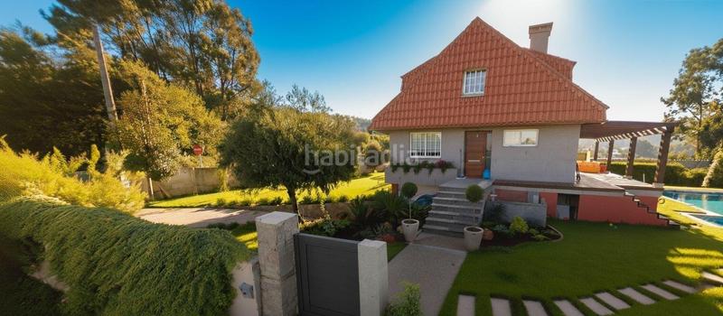 Foto f2e6d31d-bd1f-4b11-9da2-ff957113fb48. Chalet avec chauffage parking piscine dans Bembrive Vigo