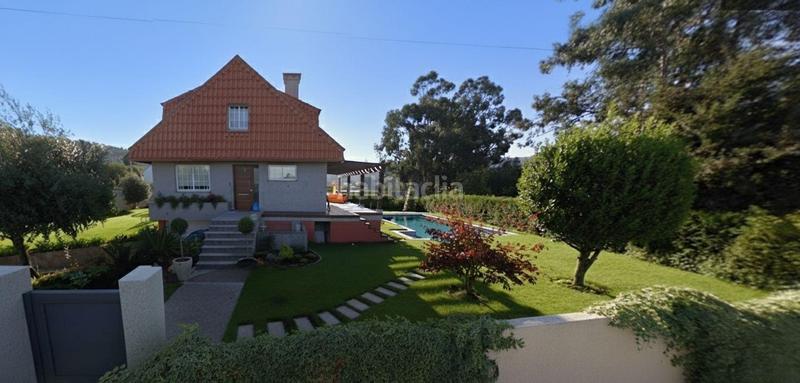 Foto f76ac48a-fe74-43e7-8884-3af3206bf570. Chalet avec chauffage parking piscine dans Bembrive Vigo