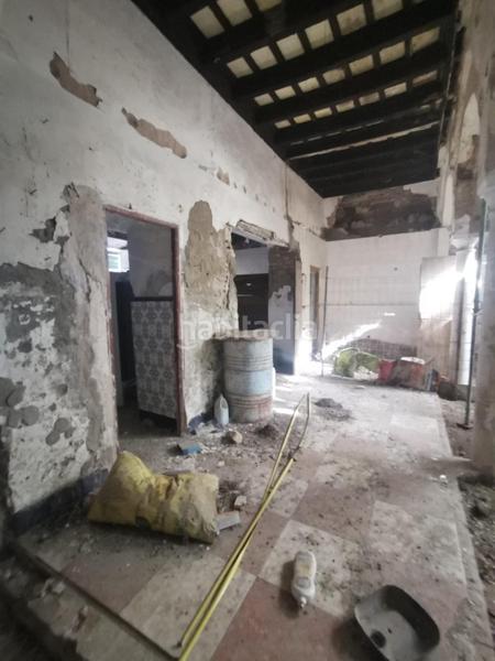 Foto 35694af4-681d-40b9-b7fd-51430ba044d9. Casa adossada a Écija