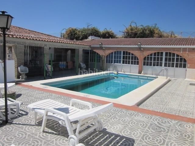 Foto a4b7294a-710a-4d25-9b76-66542bfbc768. Casa amb aparcament piscina a Cazalla de la Sierra