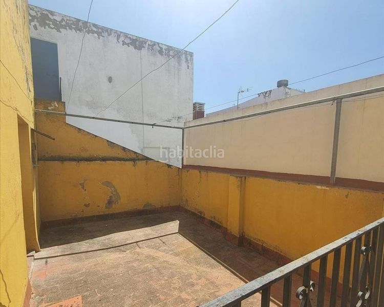 Foto 511b79ea-d468-48d1-b8eb-514b3216acec. Casa adossada a Marchena