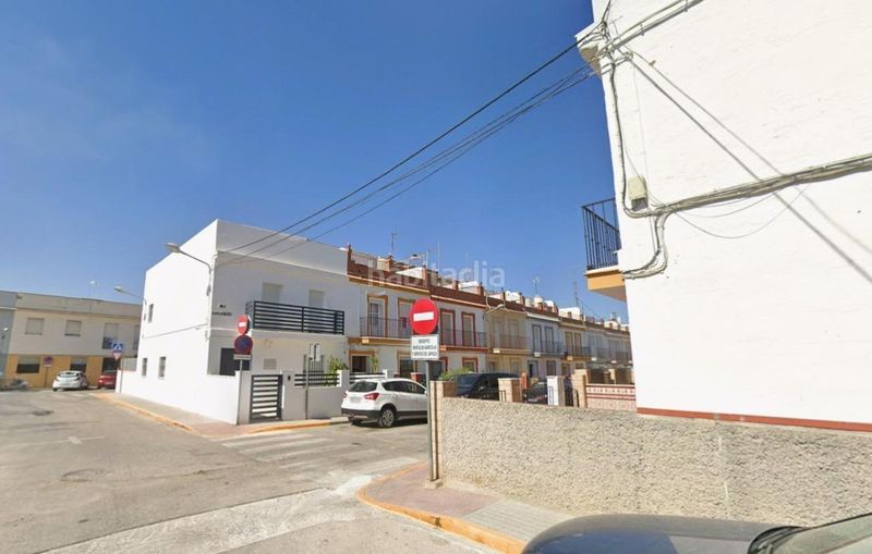 Foto c0e23999-738c-40c5-bbc1-a43491260399. Casa adossada a Marchena