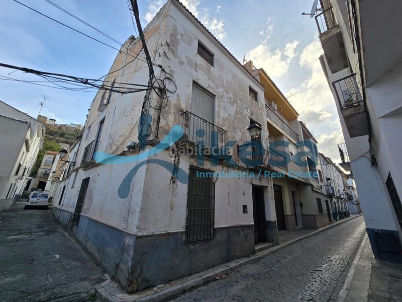 Foto 5d0cc736-e107-42f8-8734-3ddfbc07b698. Casa adossada a Loja