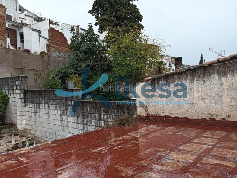Foto b956bdcd-361f-416e-b5e2-028eb7fa140b. Casa adossada a Martos