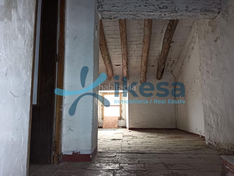Foto cf12e4a1-8d6b-4dc4-9935-4dfd1cf112a3. Casa adossada a Martos