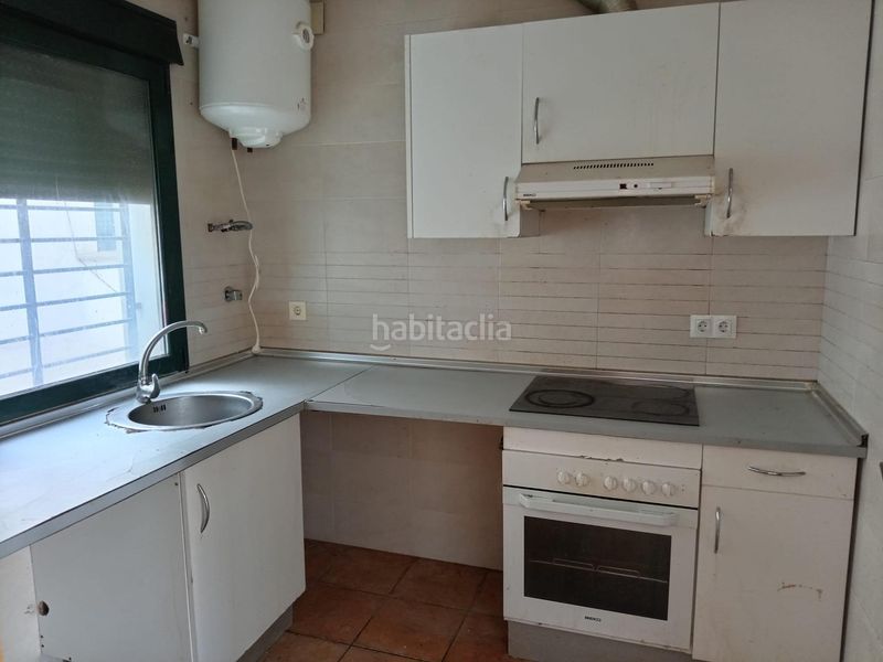 Foto dfab2782-e307-4839-a68a-52d4e2360885. Casa adossada amb aparcament a Isla Cristina
