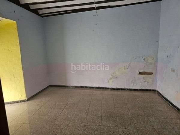 Foto a3428c50-a1f7-409b-8475-84f21d5b2fff. Casa adossada a Baena