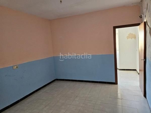 Foto e18a19e6-288c-4212-9af5-42c03af039e4. Casa adossada a Baena