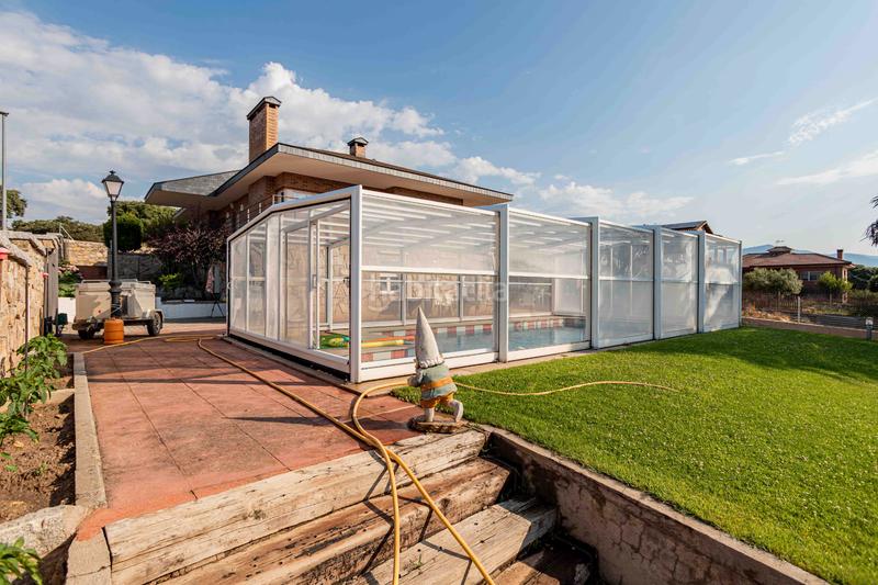 Foto b6417fb4-7049-4034-9e97-bc60a00c3fbc. Chalet la vivienda que estás buscando para tu familia! espectacular chalet independiente de 400 m2 con piscina sobre parcela de 1.000 m2 en Guadarrama