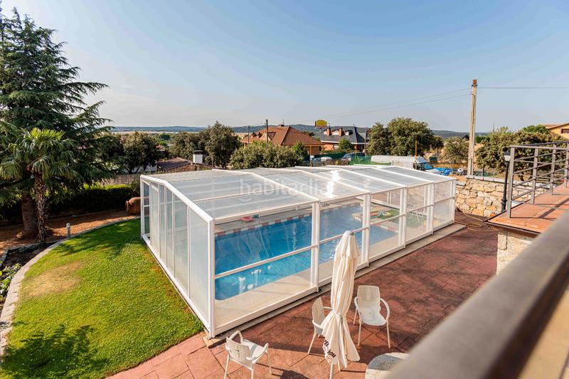 Foto f1aba83b-66af-48f5-beb0-8847c38fc3ff. Chalet la vivienda que estás buscando para tu familia! espectacular chalet independiente de 400 m2 con piscina sobre parcela de 1.000 m2 en Guadarrama