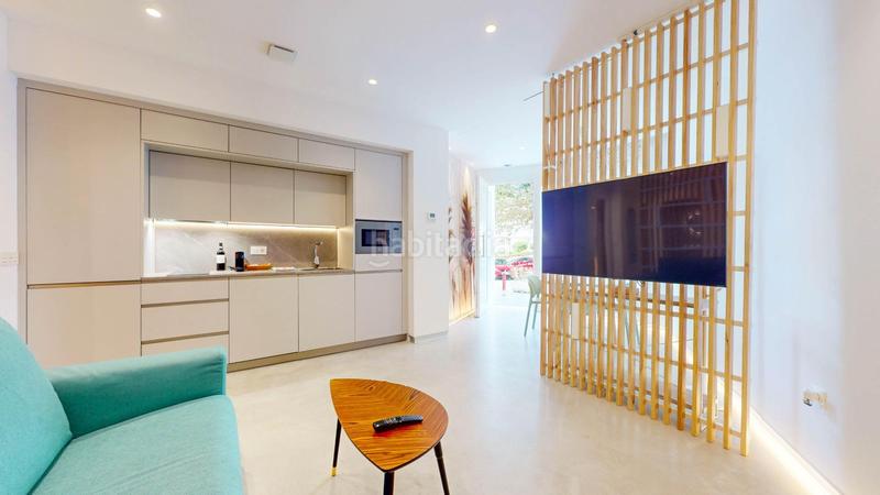 Foto 19cf0920-a4e9-4fe8-99bd-2516ab20afff. Edificio fantástico complejo de apartamentos turísticos en primera línea de playa en Mijas