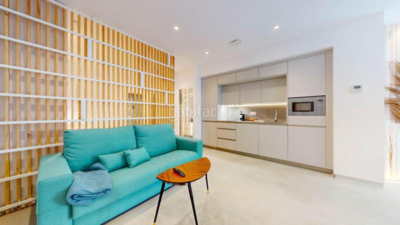 Foto 495af96c-a016-4c1a-96ac-13339a2ed600. Edificio fantástico complejo de apartamentos turísticos en primera línea de playa en Mijas