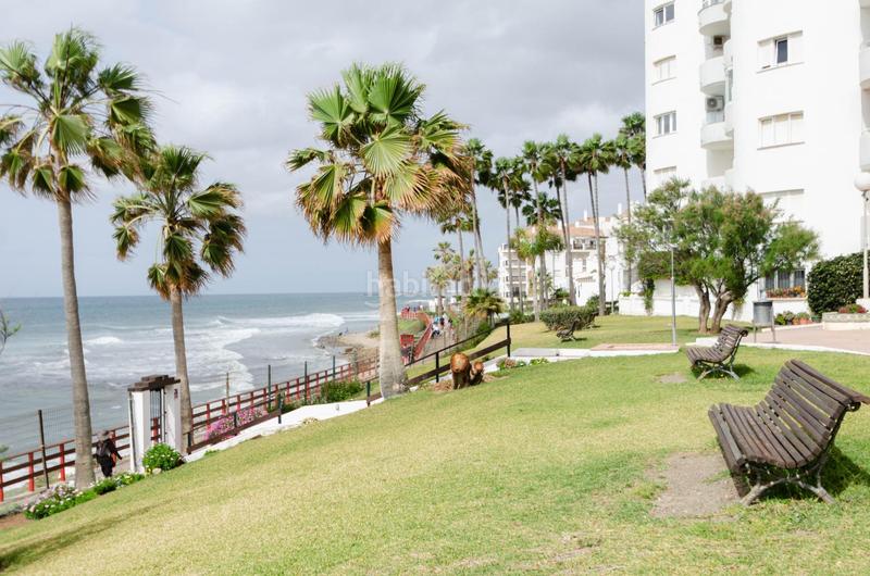 Foto b004e77b-2992-4cc0-85e3-c00cff7d8a5b. Edificio fantástico complejo de apartamentos turísticos en primera línea de playa en Mijas