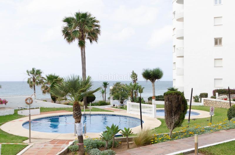 Foto c08eedbd-0bcd-4151-809d-5353db3cef4e. Edificio fantástico complejo de apartamentos turísticos en primera línea de playa en Mijas