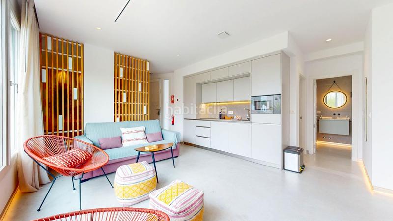 Foto ef72af90-3b9c-46e3-9462-8f09d3b6575d. Edificio fantástico complejo de apartamentos turísticos en primera línea de playa en Mijas