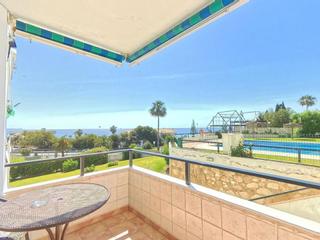Planta baja en Riviera del Sol. Piso en rentabilidad con vistas al mar y piscina en la cala de m