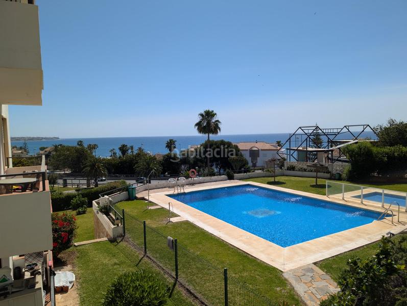Foto 53a37ee3-d3e6-4bc5-a0f3-cbd77804a4c2. Planta baja piso en rentabilidad con vistas al mar y piscina en la cala , torrenueva en Mijas