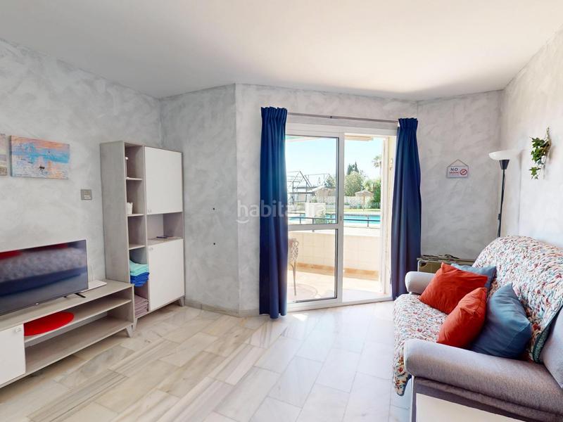 Foto 9c7f1c08-14ef-4bdc-88e4-bb70fc5ca11a. Planta baja piso en rentabilidad con vistas al mar y piscina en la cala , torrenueva en Mijas