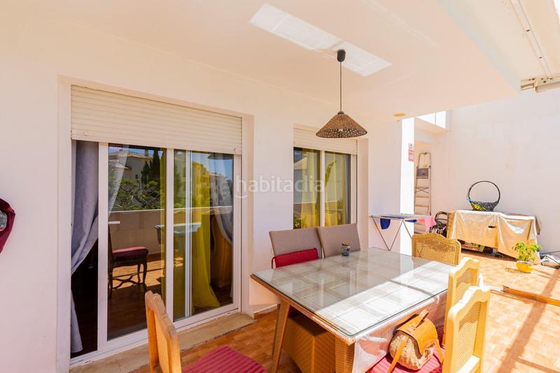 Foto 9da58ddb-5b97-49e5-b07d-c8027e6283f4. Planta baja  con gran terraza, garaje y jardín de invierno en Riviera del Sol en Mijas