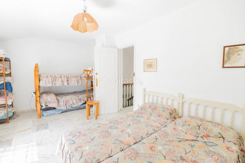Foto 6464dc07-a2a3-4a70-991a-8005aacdc2db. Casa adosada chalet adosado de 5 dormitorios con terraza y piscina comunitaria en Los Boliches, en Fuengirola