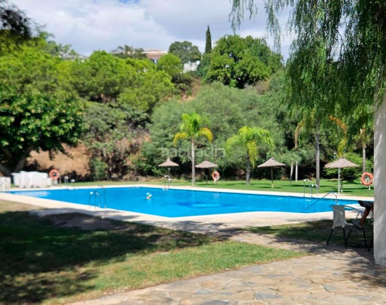 Foto f0405f8d-1f3f-4b4f-9463-1371b005f4c4. Casa amb calefacció aparcament piscina a Torremuelle Benalmádena