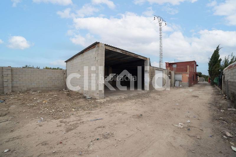 Foto 95dd65bf-cba1-403a-a9dc-d5fc588f3c41. Casa en Oliva nova Oliva