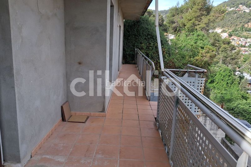 Foto 8d6c59d9-f8ee-4d9a-9340-2ff85f8b8e2a. Casa amb aparcament a Vallirana