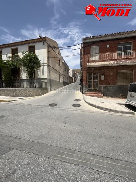Foto 0b743eb7-b58a-45d7-abe4-ee3d0a6ffc69. Terreno residencial 10 m de fachada19 m de fondotiene un pozo en Padul