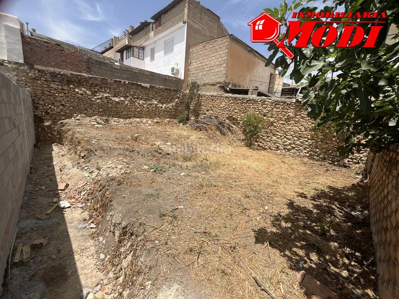Foto 8ffbb86b-4468-49f5-8b19-f8ac8a1ff12d. Terreno residencial 10 m de fachada19 m de fondotiene un pozo en Padul