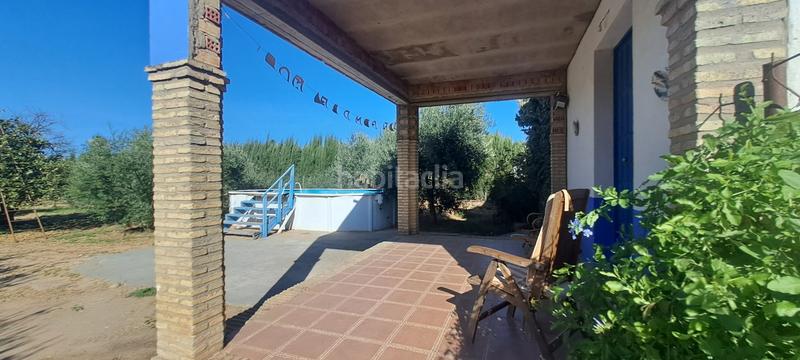 Foto f7b94596-7f7c-4e44-8f9e-d8c140b0270a. Masía en exclusiva con remax finanbank presentamos esta finca rústica de 1.700 m de parcela y 138 m construidos, ubicada en una excelent en Pilas
