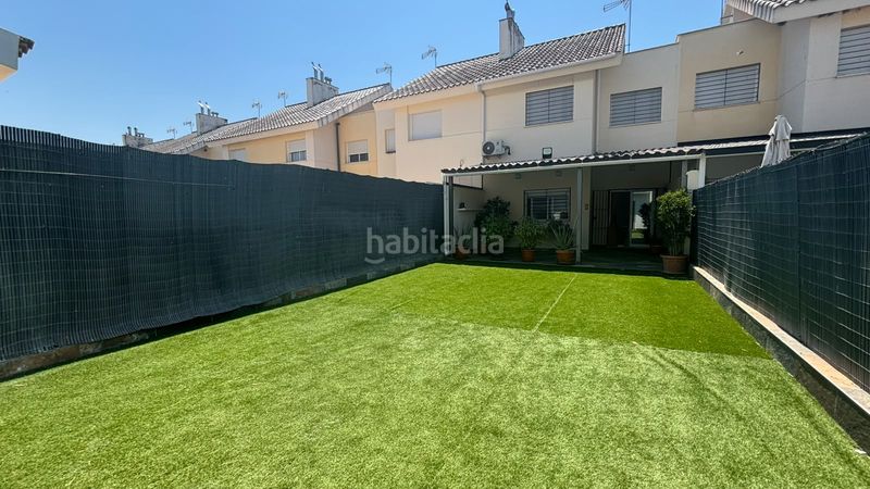Foto c92559e8-e0ee-440b-ae80-b8d949a8da98. Casa adossada amb aparcament a Huévar