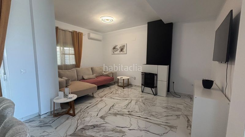 Foto ec180712-1108-4070-a7c3-7ea252d1418d. Casa adossada amb aparcament a Huévar