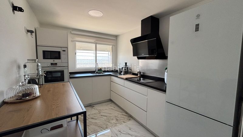 Foto ffa8e60d-ebe1-4c5e-9b91-c52a41adc038. Casa adossada amb aparcament a Huévar