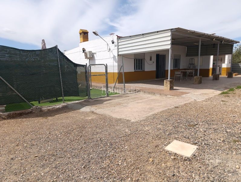 Foto 7ea3abbd-24a5-4b7c-9470-eba273514b46. Casa amb aparcament a Espartinas pueblo Espartinas