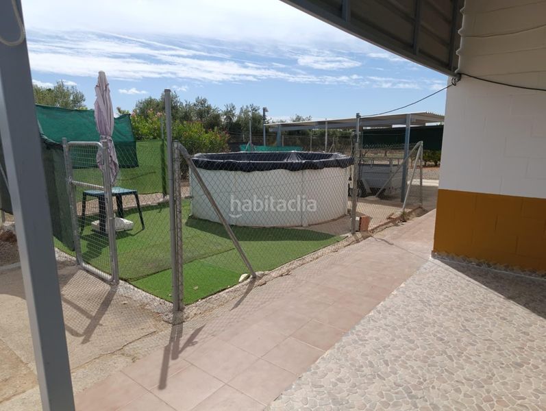 Foto 9ed8abe1-9906-427e-bd27-b10bd39c42db. Casa amb aparcament a Espartinas pueblo Espartinas