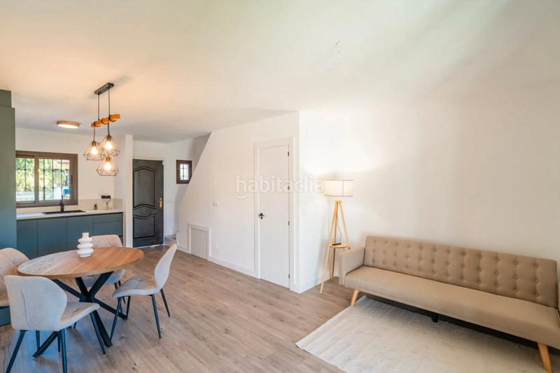 Foto 0ae12f56-3069-45c9-bfb6-8ef66337f85b. Casa adosada en urbanización pueblo la campana 7 en Mijas