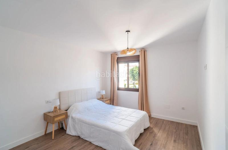 Foto 66ce1a40-d82f-4e6d-8168-37aa43e33a1f. Casa adosada en urbanización pueblo la campana 7 en Mijas