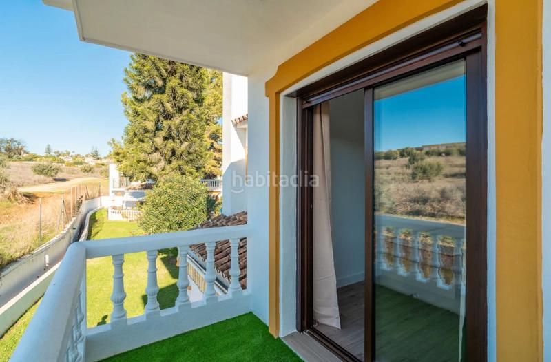 Foto dad7ec47-18c4-4927-abe2-a8e355cfbeb9. Casa adosada en urbanización pueblo la campana 7 en Mijas