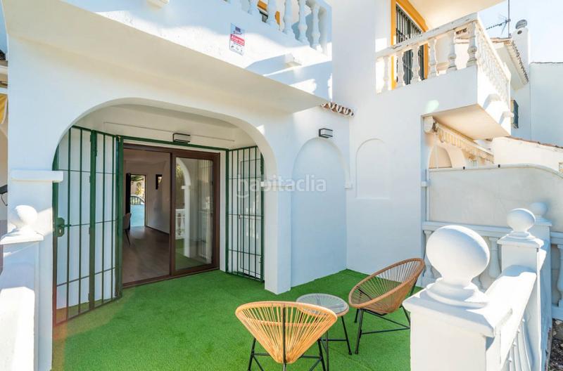 Foto 7af5a459-e4ae-45e7-8f4a-a5309ffd0b4e. Casa adossada a urbanización pueblo la campana 7 a Mijas