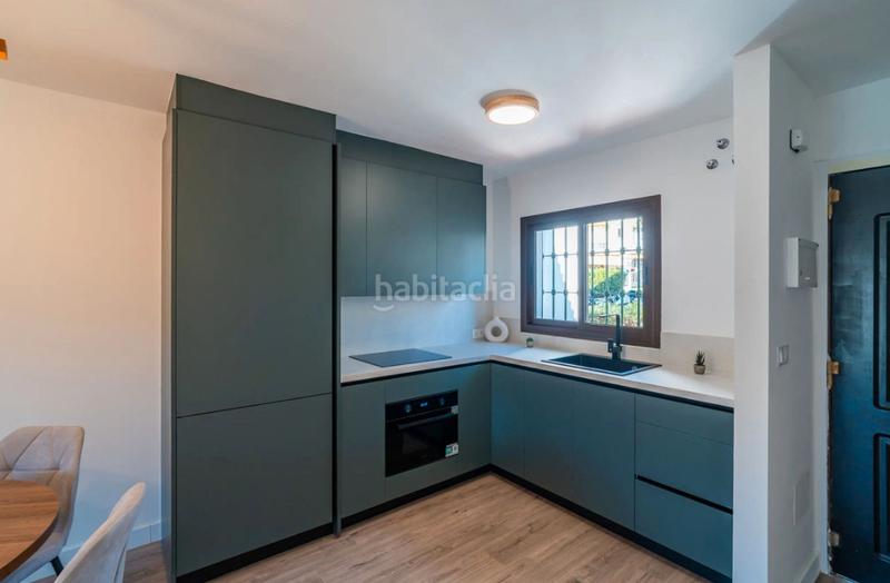 Foto c76d5aa8-e22b-4a92-85fd-93e02e45e91a. Casa adossada a urbanización pueblo la campana 7 a Mijas