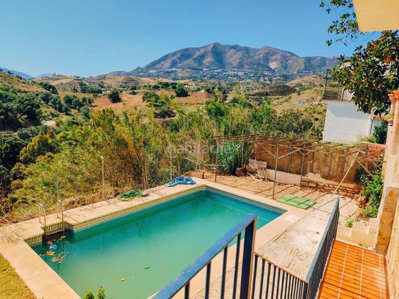 Foto c5061a62-47f9-4cf0-8ed1-f7a94f065b93. Maison jumelée avec cheminée piscine dans Torreblanca del Sol Fuengirola