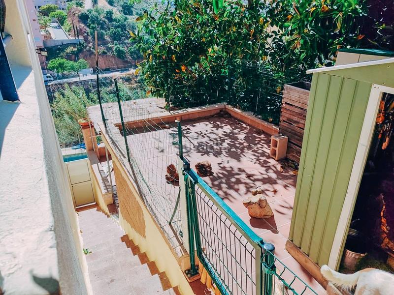 Foto f1b7c972-16e9-4091-9017-c32a6c98993b. Maison jumelée avec cheminée piscine dans Torreblanca del Sol Fuengirola