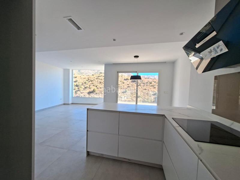 Foto 13938a58-d734-44b2-ba11-3d623ea73143. Maison jumelée avec parking piscine dans Torreblanca del Sol Fuengirola