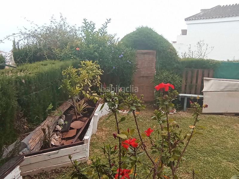 Foto 0f7f00cf-7937-42e2-900a-23e16acc15f2. Planta baja magnífico piso planta baja con jardín privado, parking asignado y piscina comunitaria en Mijas