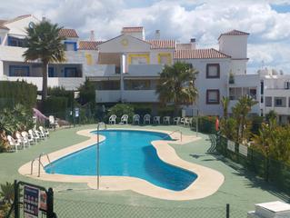 Piano terra en Riviera del Sol. Magnfico piso planta baja con jardn privado, parking asignado
