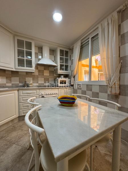 Foto 911ac33e-c2aa-4be7-a4e0-462beb971fba. Piso magnífico piso con terraza, garaje y piscina comunitaria en Fuengirola