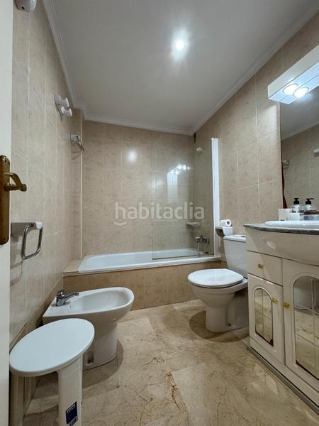 Foto dce86fea-0359-4af0-bbcf-3b91249742ea. Piso magnífico piso con terraza, garaje y piscina comunitaria en Fuengirola