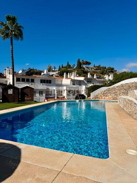 Foto 0124554b-a061-4c6b-a049-2a3c2d0e5cdc. Casa adossada amb xemeneia aparcament piscina a campo de Mijas Mijas