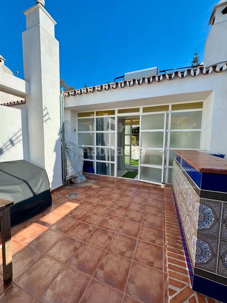 Foto 39b9f7b9-c949-4111-b08d-7aa21c235acf. Casa adossada amb xemeneia aparcament piscina a campo de Mijas Mijas