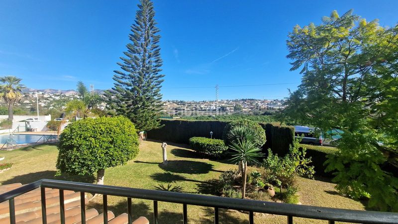Foto ede0f6c7-d8c1-4c1a-bc78-47eb5e58676f. Casa adossada amb xemeneia piscina a Mijas golf Mijas